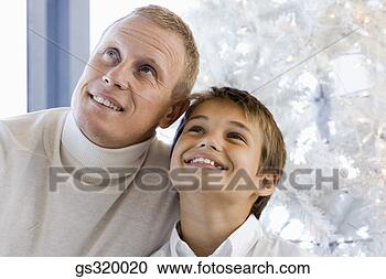 Stock Photography - father and son 
looking up. fotosearch 
- search stock 
photos, pictures, 
images, and photo 
clipart