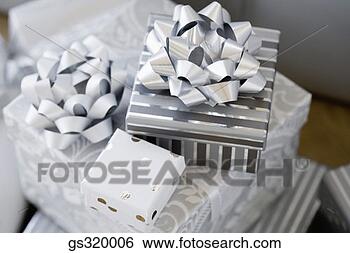 Stock Photo - gifts with bows. 
fotosearch - search 
stock photos, 
pictures, images, 
and photo clipart