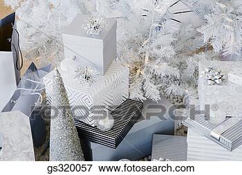 Picture - gifts by christmas 
tree. fotosearch 
- search stock 
photos, pictures, 
images, and photo 
clipart