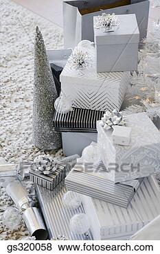 Stock Photo - piled christmas 
gifts. fotosearch 
- search stock 
photos, pictures, 
images, and photo 
clipart