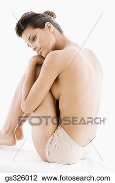 Banco de Imagem - mulher,  segurando, 
 pernas. fotosearch 
- busca de fotos, 
imagens e clipart