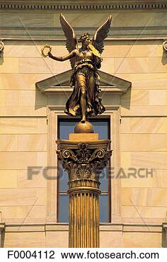 Stock Photo - column, pillar, 
angel, statue, 
sculpture, gold, 
golden. fotosearch 
- search stock 
photos, pictures, 
images, and photo 
clipart