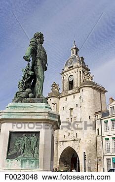 Stock Photo - france, poitou 
charentes, re 
island, la rochelle, 
la grosse horloge. 
fotosearch - search 
stock photos, 
pictures, images, 
and photo clipart