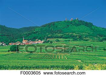 Stock Image - france,  alsace, 
 village of husseren-les-châteaux 
and the three. 
fotosearch - search 
stock photos, 
pictures, images, 
and photo clipart