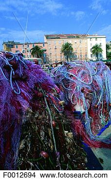 Stock Photo - corsica, ajaccio, 
harbour, fishing 
nets. fotosearch 
- search stock 
photos, pictures, 
images, and photo 
clipart