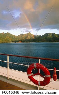 Stock Photo - french polynesia, 
leeward islands, 
rainbow at huahine 
pass. fotosearch 
- search stock 
photos, pictures, 
images, and photo 
clipart