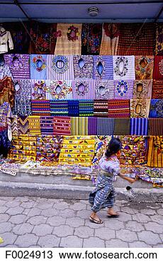 Stock Photo - guatemala,  santiago 
atitlan,  traditional 
clothes for sale 
at the. fotosearch 
- search stock 
photos, pictures, 
images, and photo 
clipart