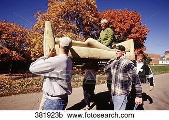 Stock Photography - college students 
moving couch w/ 
student  on it. 
fotosearch - search 
stock photos, 
pictures, images, 
and photo clipart