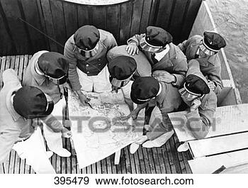 Stock Photograph - captain and sailors 
with map. fotosearch 
- search stock 
photos, pictures, 
images, and photo 
clipart