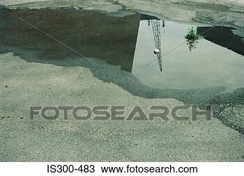 Stock Photo - puddle in a road. 
fotosearch - search 
stock photos, 
pictures, images, 
and photo clipart