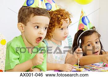 Stock Photo - two girls and 
a boy at a birthday 
party. fotosearch 
- search stock 
photos, pictures, 
images, and photo 
clipart