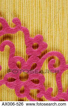 Stock Photo - close-up of a 
floral design 
over a woven mat. 
fotosearch - search 
stock photos, 
pictures, images, 
and photo clipart