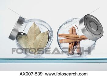 Stock Photograph - close-up of herbs 
in two jars. fotosearch 
- search stock 
photos, pictures, 
images, and photo 
clipart