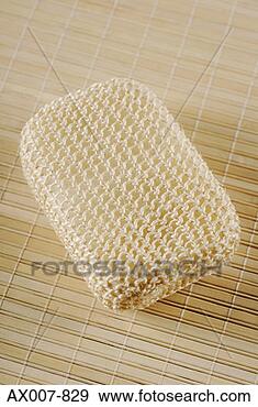 Stock Photograph - close-up of a 
loofah on a mat. 
fotosearch - search 
stock photos, 
pictures, images, 
and photo clipart