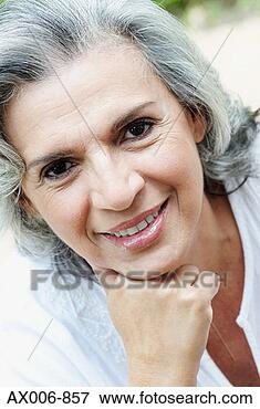 Picture - portrait of a 
senior woman smiling. 
fotosearch - search 
stock photos, 
pictures, images, 
and photo clipart