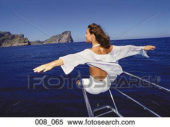 Stock Image - woman on sailing 
boat. fotosearch 
- search stock 
photos, pictures, 
images, and photo 
clipart