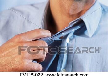 Stock Photo - loosening the 
tie. fotosearch 
- search stock 
photos, pictures, 
images, and photo 
clipart