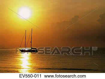 Stock Photography - sailing boat in 
sunset. fotosearch 
- search stock 
photos, pictures, 
images, and photo 
clipart