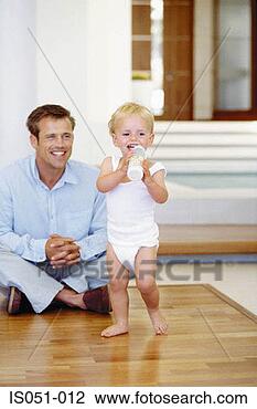 Stock Photo - young dad with 
toddler. fotosearch 
- search stock 
photos, pictures, 
images, and photo 
clipart
