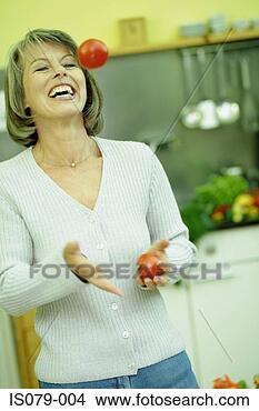 Stock Photo - woman in kitchen. 
fotosearch - search 
stock photos, 
pictures, images, 
and photo clipart