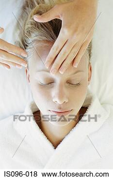 Stock Photo - woman receiving 
facial massage. 
fotosearch - search 
stock photos, 
pictures, images, 
and photo clipart