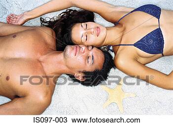 Stock Photo - romantic man and 
woman on beach. 
fotosearch - search 
stock photos, 
pictures, images, 
and photo clipart