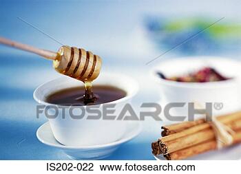 Stock Photo - honey and cinnamon. 
fotosearch - search 
stock photos, 
pictures, images, 
and photo clipart