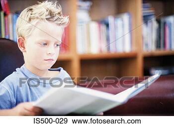 Stock Photograph - boy doing homework. 
fotosearch - search 
stock photos, 
pictures, images, 
and photo clipart