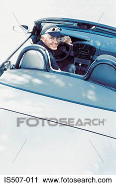 Stock Photography - man with his porche 
convertable. fotosearch 
- search stock 
photos, pictures, 
images, and photo 
clipart