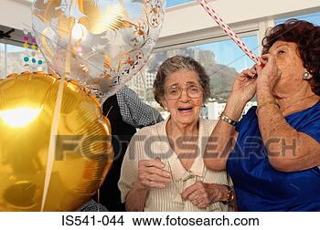 Stock Photo - two elderly women 
celebrating. fotosearch 
- search stock 
photos, pictures, 
images, and photo 
clipart