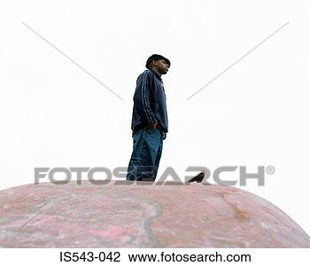 Stock Photo - skateboarder standing 
on ramp. fotosearch 
- search stock 
photos, pictures, 
images, and photo 
clipart