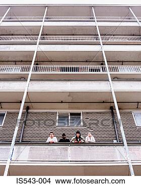 Stock Photo - teenagers standing 
on balcony. fotosearch 
- search stock 
photos, pictures, 
images, and photo 
clipart