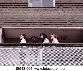 Stock Image - teenagers standing 
on balcony. fotosearch 
- search stock 
photos, pictures, 
images, and photo 
clipart