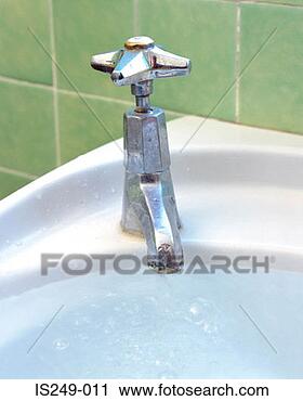 Stock Photography - basin brimming 
with tap water. 
fotosearch - search 
stock photos, 
pictures, images, 
and photo clipart