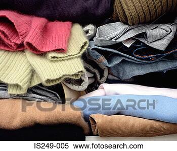 Stock Image - clothes folded 
in cupboard. fotosearch 
- search stock 
photos, pictures, 
images, and photo 
clipart