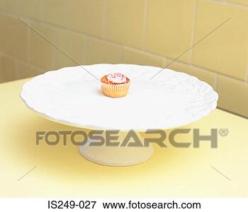 Picture - cup-cake on a 
cake dish. fotosearch 
- search stock 
photos, pictures, 
images, and photo 
clipart