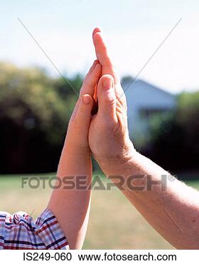 Stock Photography - hand of man and 
boy touching. 
fotosearch - search 
stock photos, 
pictures, images, 
and photo clipart