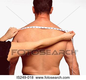 Stock Photo - measuring across 
male back. fotosearch 
- search stock 
photos, pictures, 
images, and photo 
clipart