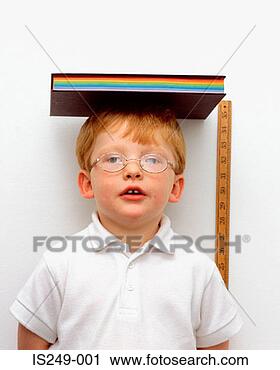 Stock Photography - measuring height 
of young boy. 
fotosearch - search 
stock photos, 
pictures, images, 
and photo clipart