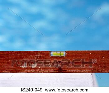 Stock Photograph - spirit level against 
blue sky. fotosearch 
- search stock 
photos, pictures, 
images, and photo 
clipart