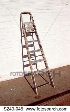 Stock Image - stepladder leaning 
against wall. 
fotosearch - search 
stock photos, 
pictures, images, 
and photo clipart