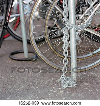 Stock Photograph - chained up bicycles. 
fotosearch - search 
stock photos, 
pictures, images, 
and photo clipart