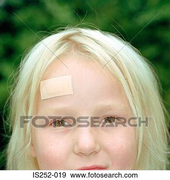 Stock Photograph - girl with plaster 
on her forehead. 
fotosearch - search 
stock photos, 
pictures, images, 
and photo clipart
