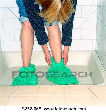 Stock Image - keeping the feet 
dry. fotosearch 
- search stock 
photos, pictures, 
images, and photo 
clipart