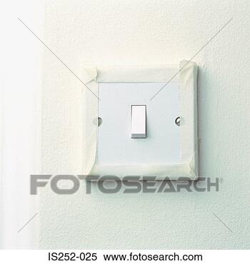 Stock Image - light switch with 
masking tape. 
fotosearch - search 
stock photos, 
pictures, images, 
and photo clipart