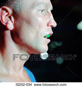 Stock Photo - man with gum shield. 
fotosearch - search 
stock photos, 
pictures, images, 
and photo clipart