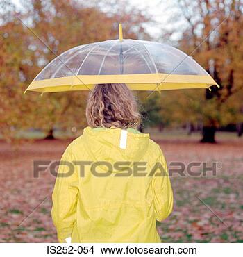 Stock Photo - woman with see-through 
umbrella. fotosearch 
- search stock 
photos, pictures, 
images, and photo 
clipart