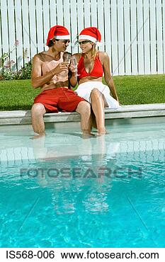 Stock Photo - celebrating christmas 
by the swimming 
pool. fotosearch 
- search stock 
photos, pictures, 
images, and photo 
clipart