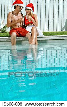 Stock Photo - celebrating christmas 
by the swimming 
pool. fotosearch 
- search stock 
photos, pictures, 
images, and photo 
clipart