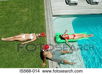 Stock Photo - christmas by the 
swimming pool. 
fotosearch - search 
stock photos, 
pictures, images, 
and photo clipart